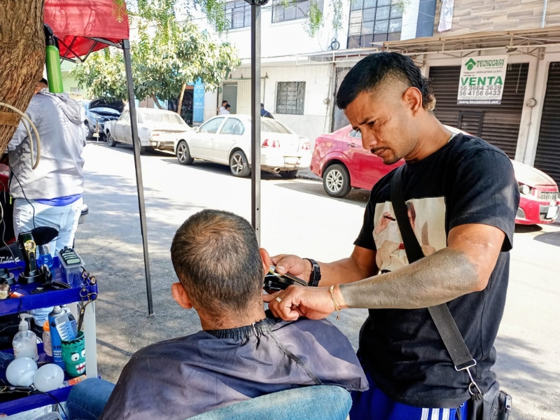 Barberia migrante en CDMX